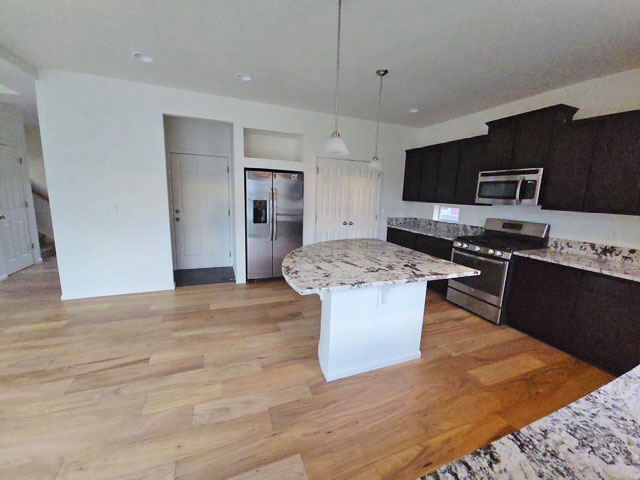 Cabinets, tile, light fixtures, plumbing fixtures, granite-quartz slab installation