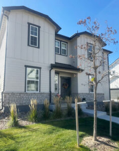 New siding, window trim, and exterior painting