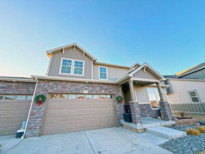 House wrap, siding, window trim, fascia, soffit, roofing, exterior paint, gutters, and downspouts