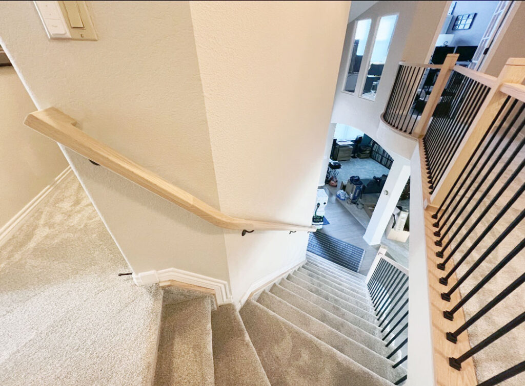 Custom handrails down staircase