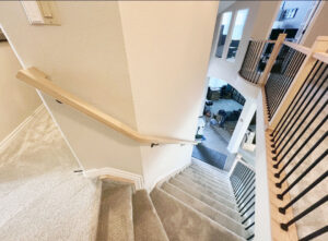 Custom handrails down staircase