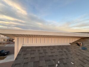 exterior vinyl siding near roof top