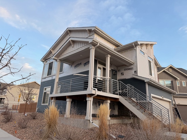 exterior vinyl siding complete front-side view